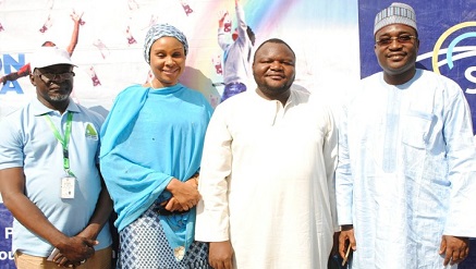 (L-r):‎ Aminu Sifawa‎, coordinator, National Lottery Regulatory Commission Sokoto; Nkolika Okoli, ‎group head Retail, Skye Bank Plc.; Dahiru Sadiq, ‎winner in the One Million Naira category; and ‎Mohammed Kawu, ‎regional director North Skye Bank, at the Skye Bank Reach for the Skye Millionaire Reward Draw held in Shehu Shagari Market, Sokoto State‎